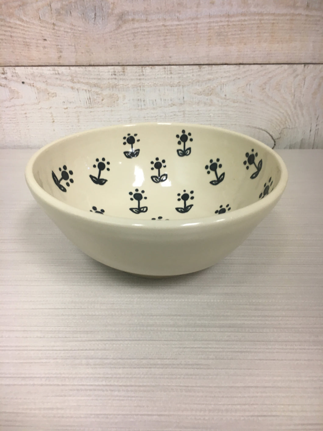 Handmade Ceramic Bowl with Black Flower Design